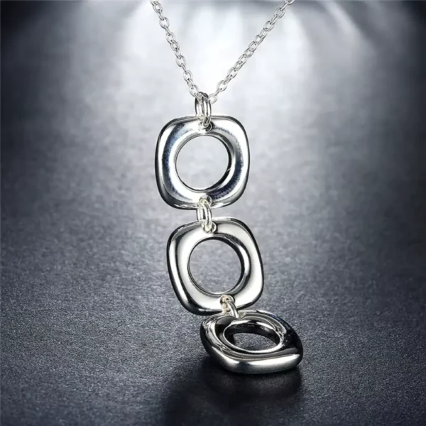 Conjunto Collar y Aros Geométricos Colgantes