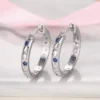 Aros Argolla Huggie Estrellas y Lunas Azules Fondo Aros Argolla Huggie Estrellas y Lunas Azules Fondo